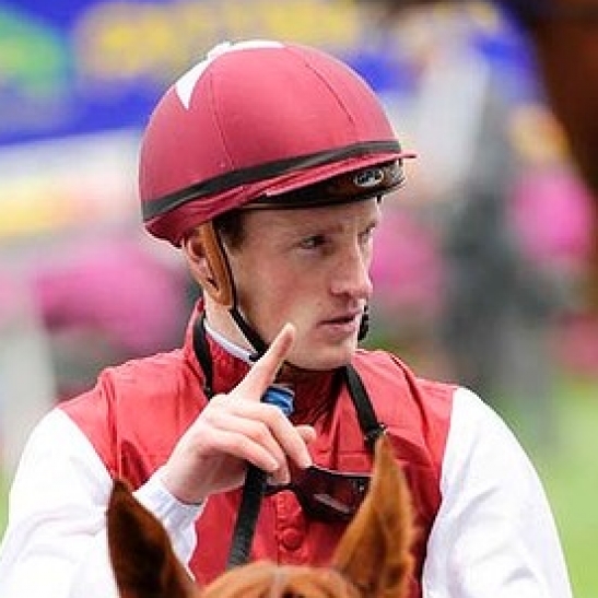 Melbourne jockey has relationship with Darley temporarily suspended over race fixing investigation.